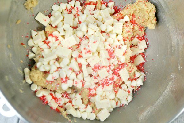 Add in the white chocolate and peppermint candy pieces.