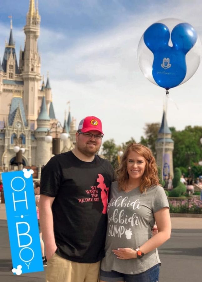 Baby photo Disney themed baby announcement photo at the Magic Kingdom.